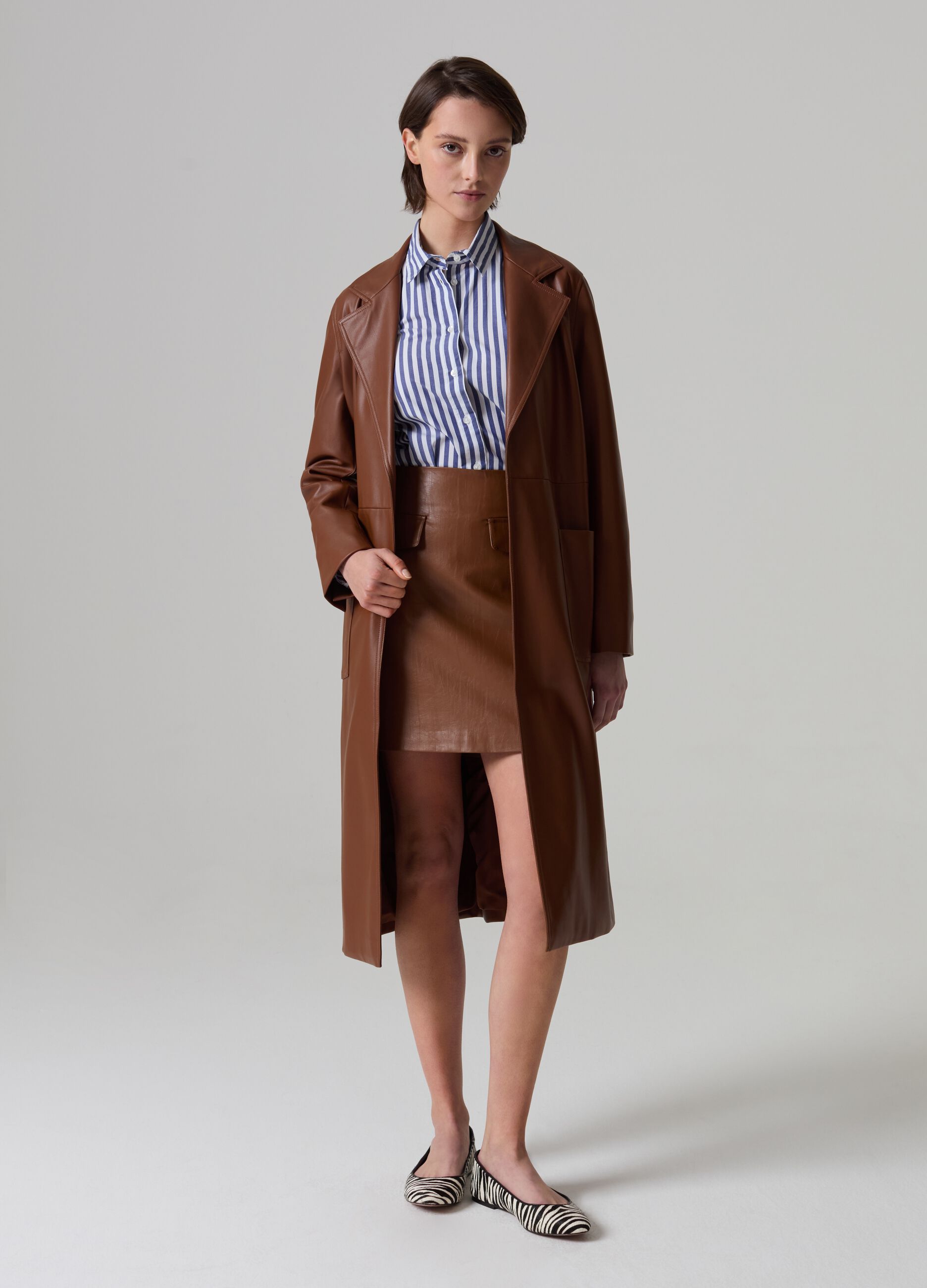 Long glossy-effect trench coat with belt