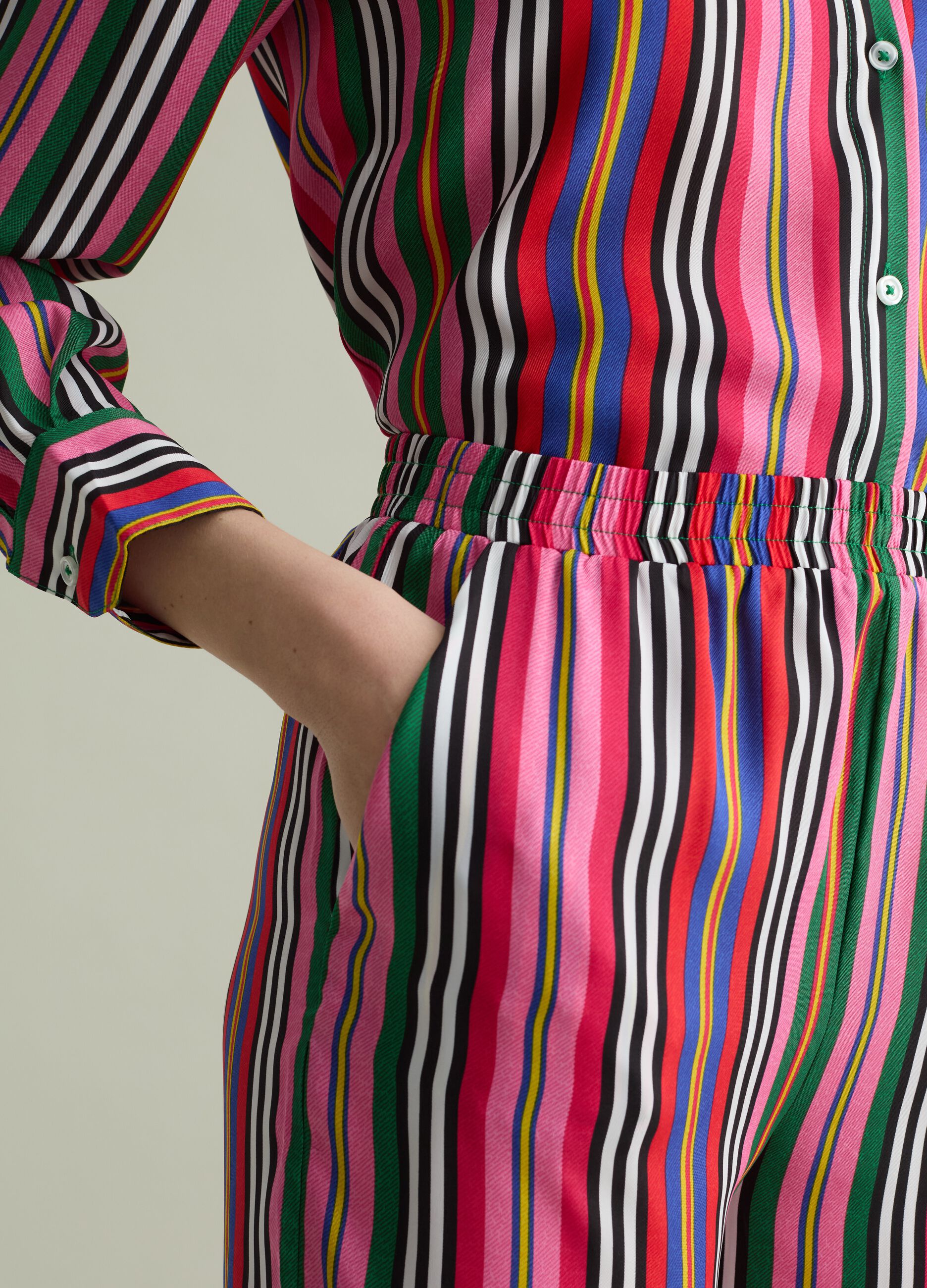 Fluid trousers with multicoloured stripes
