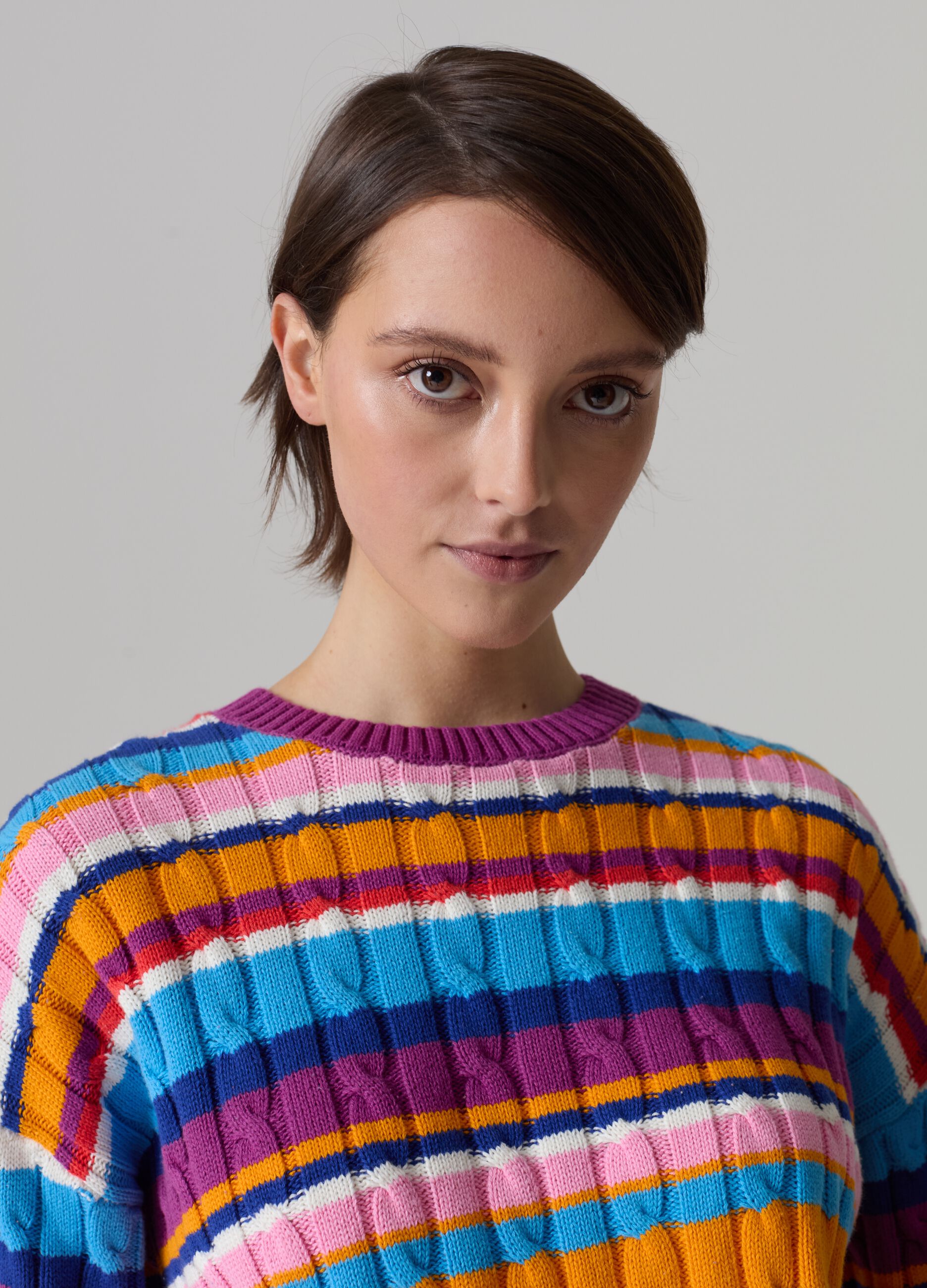 Striped pullover with cable-knit design