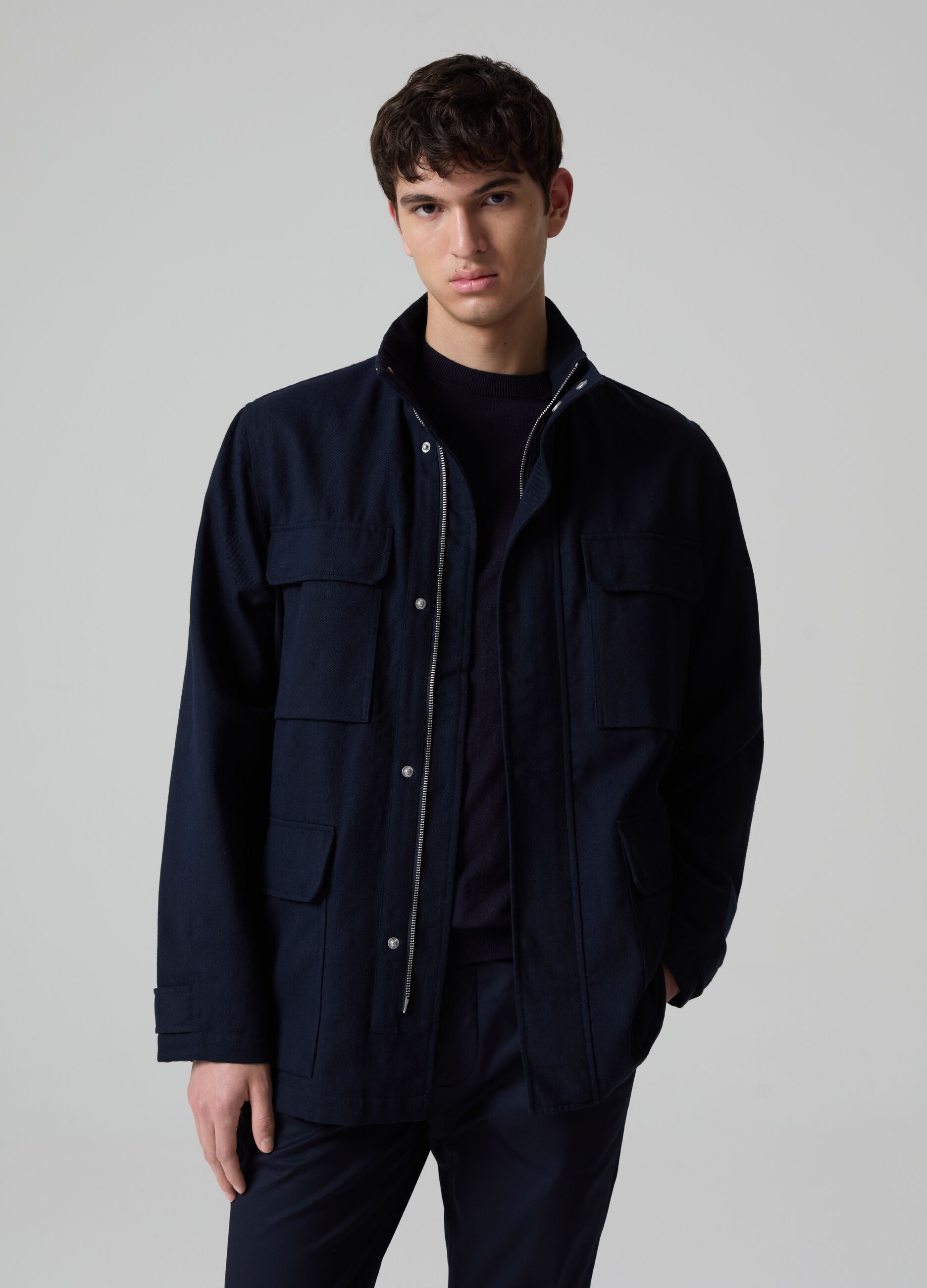 Contemporary short jacket with high neck