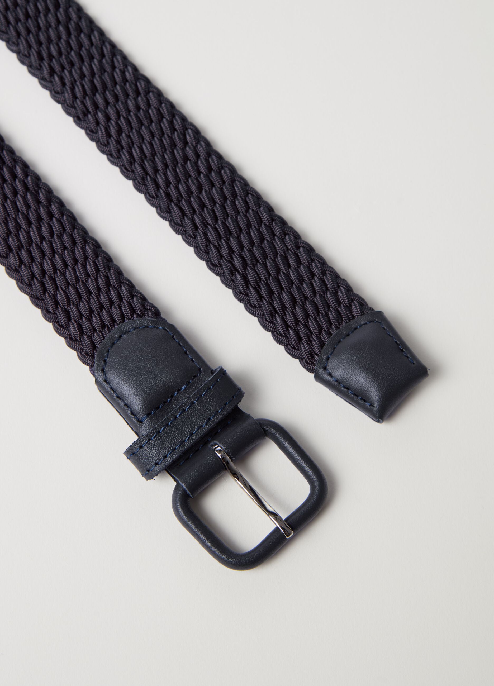 Belt in woven fabric