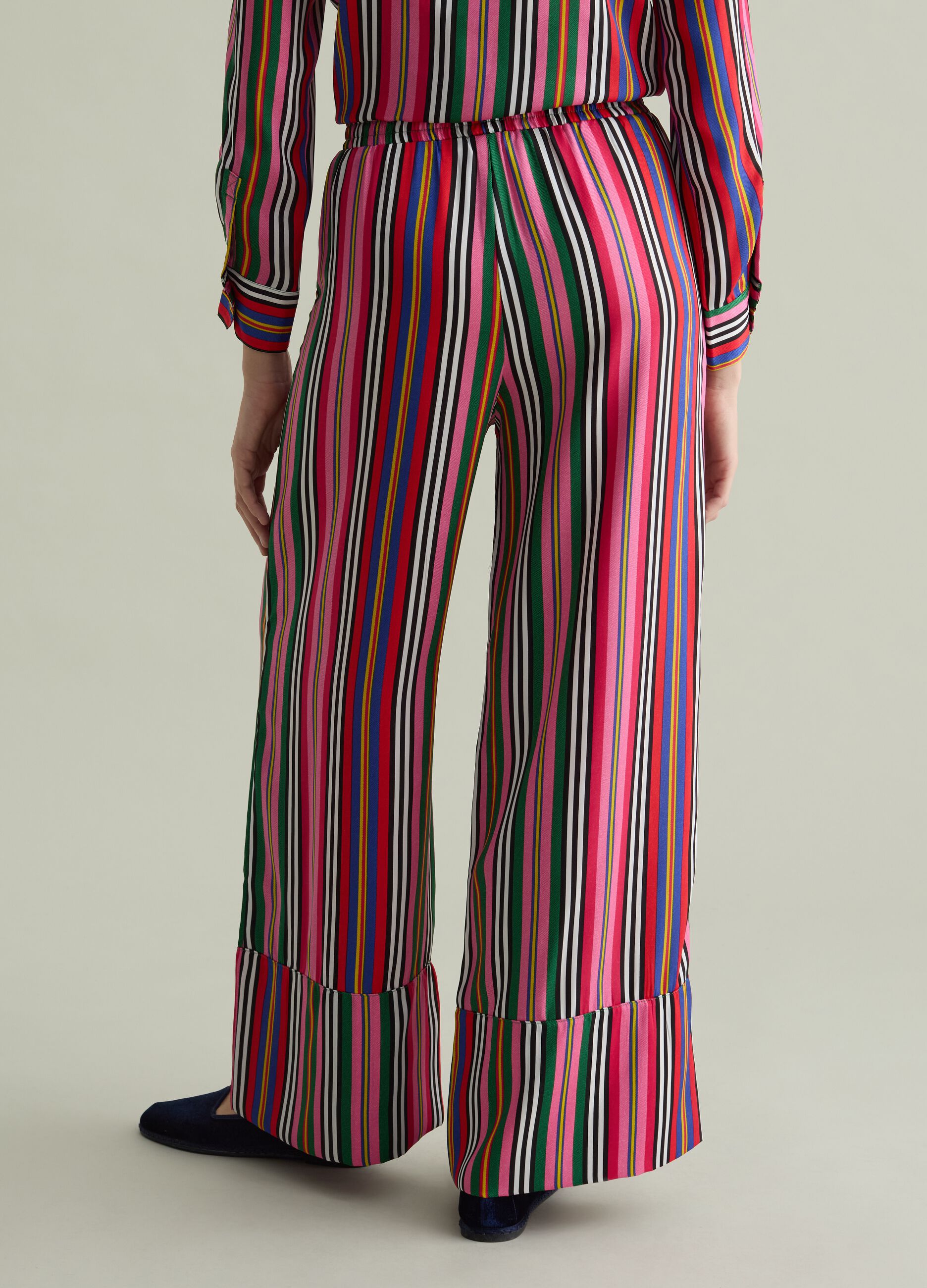 Fluid trousers with multicoloured stripes