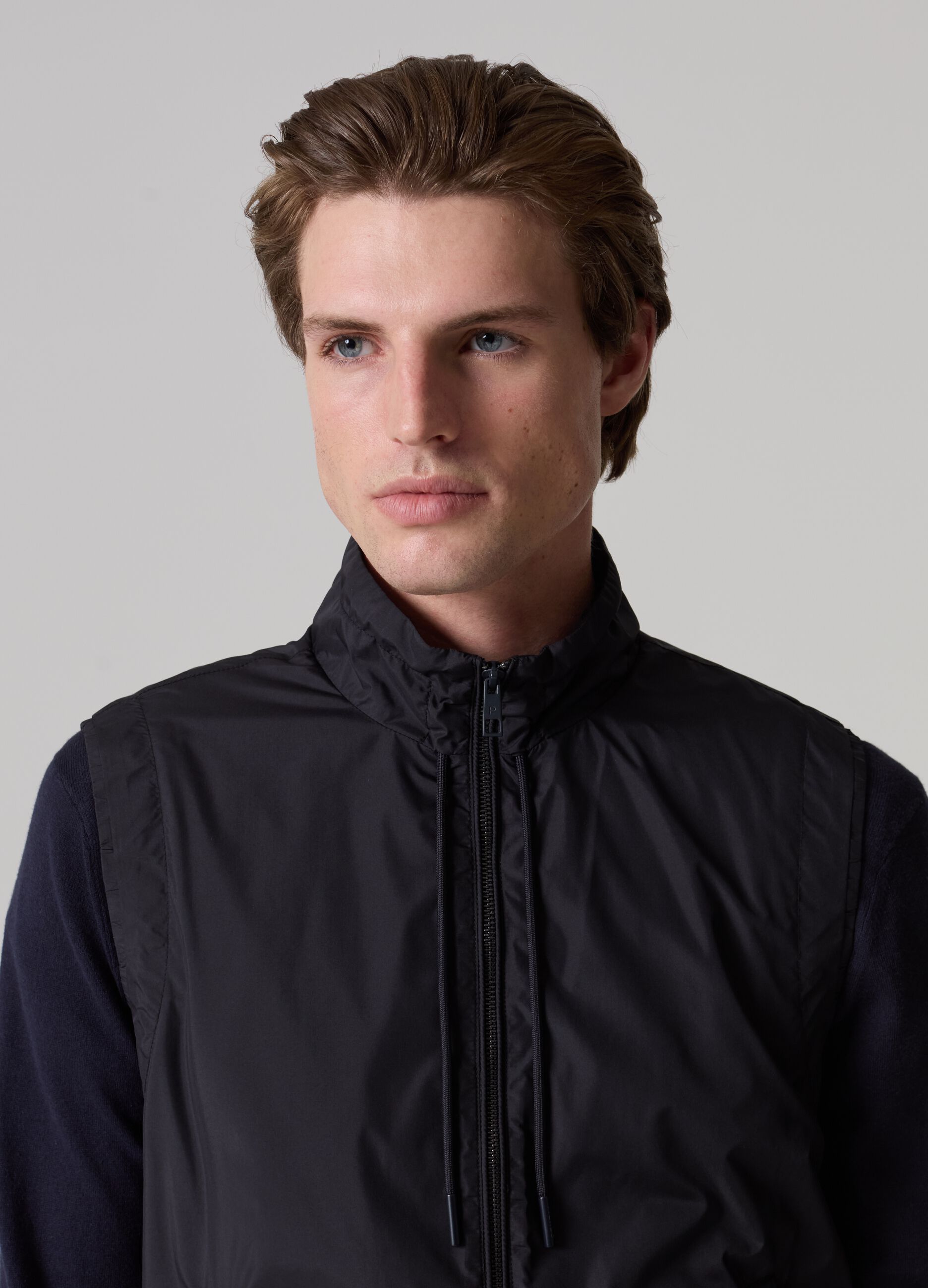 Contemporary full-zip gilet with high neck