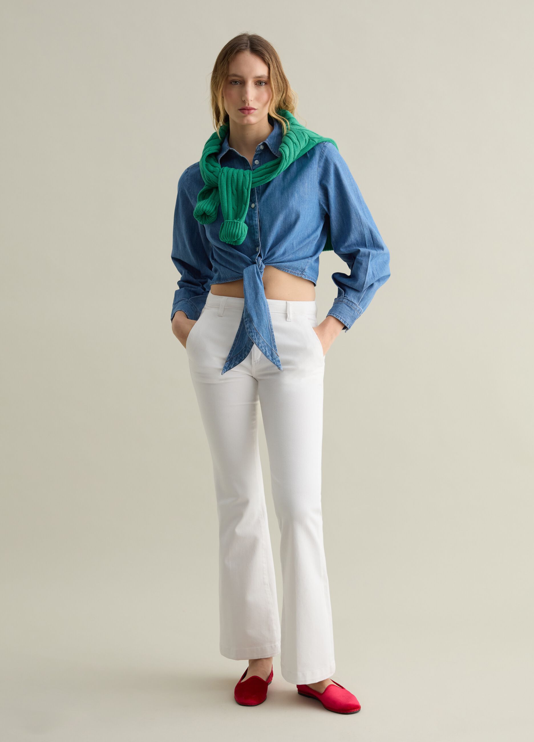 Blue denim shirt with knot