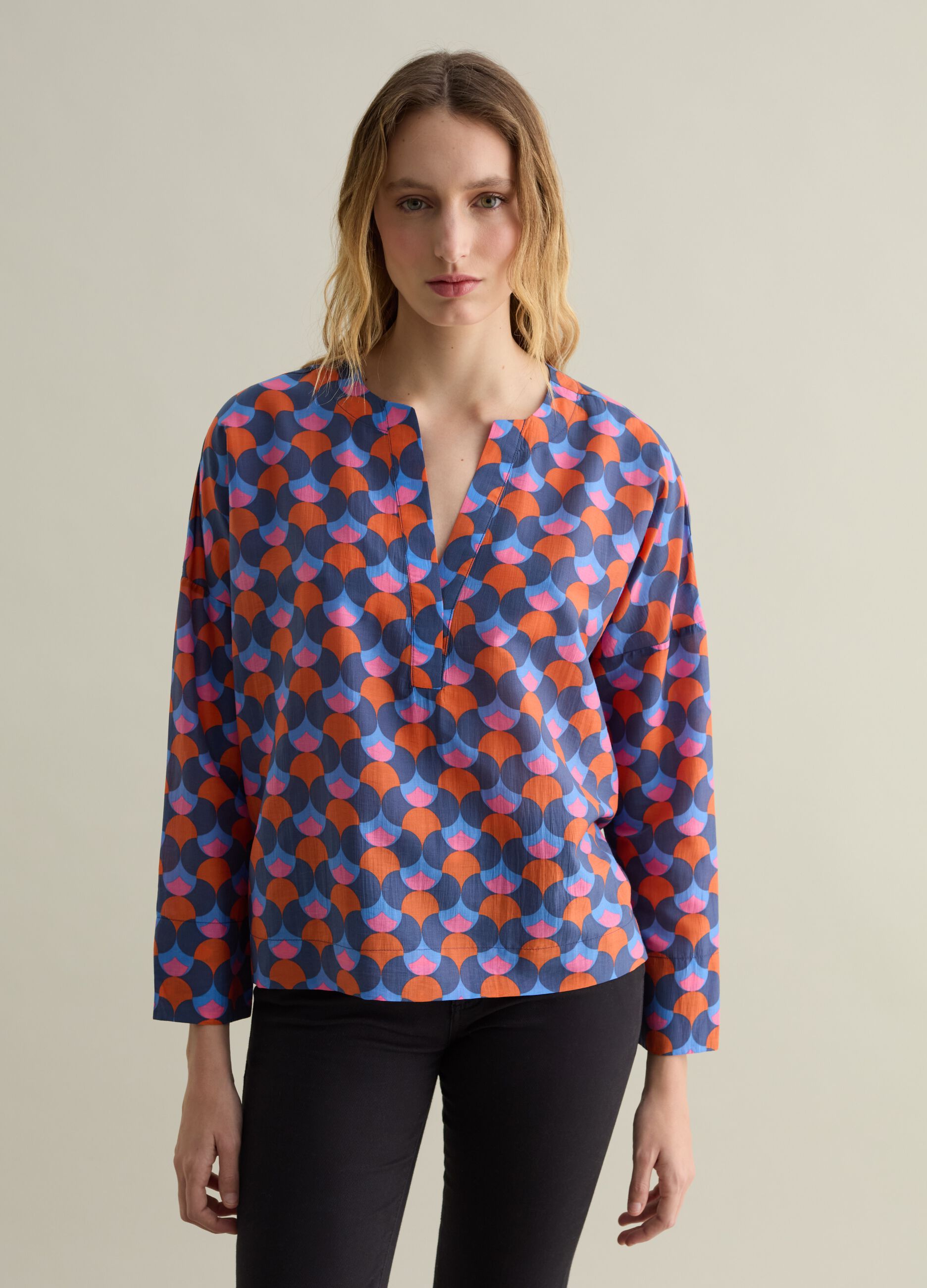 Blouse with optical pattern and V neck