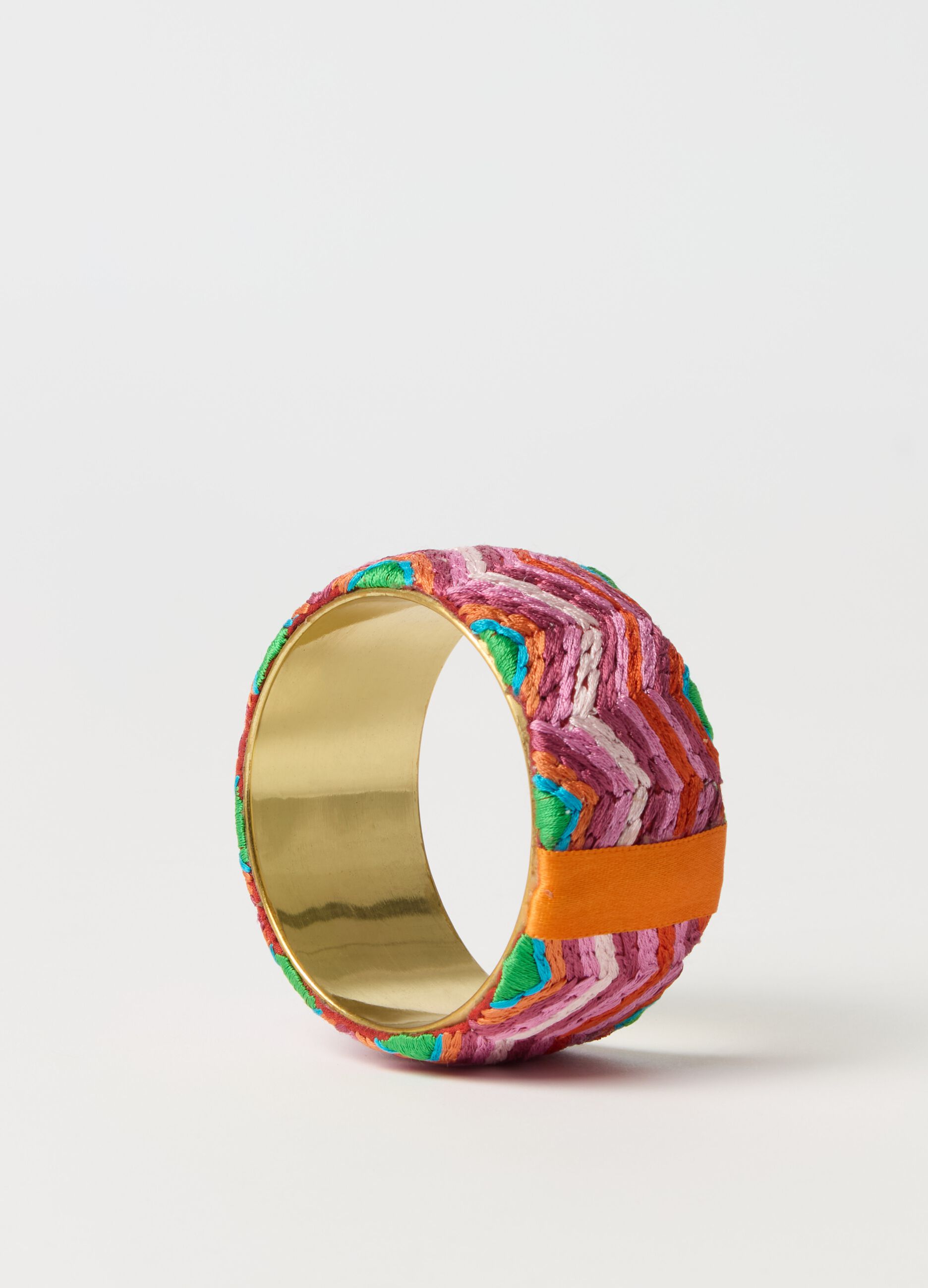 Solid bracelet with multicoloured strands