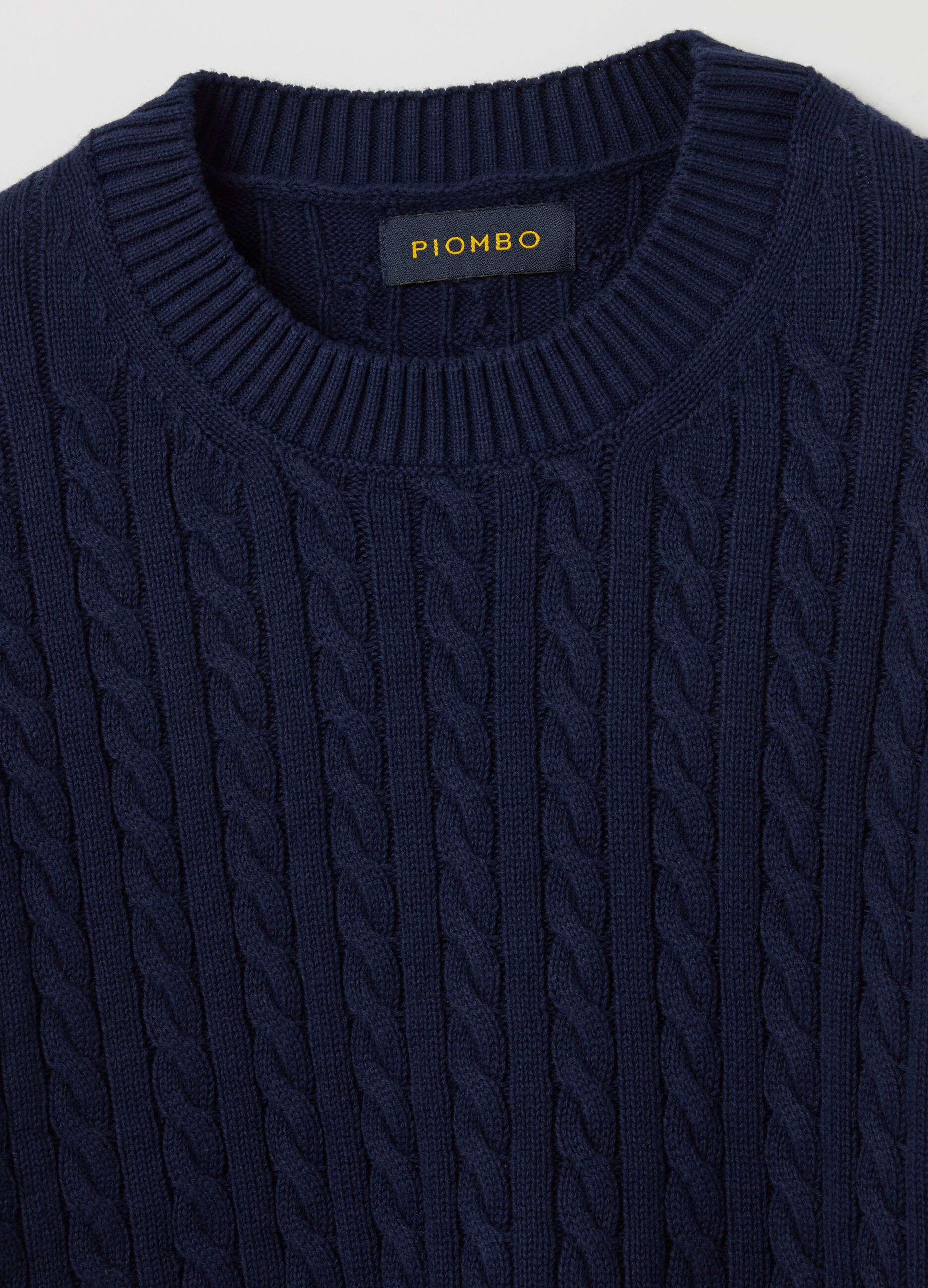Ribbed pullover with cable-knit design