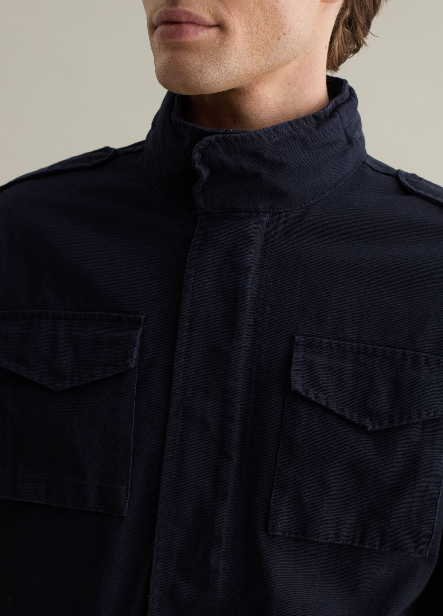 Short safari jacket with internal hood
