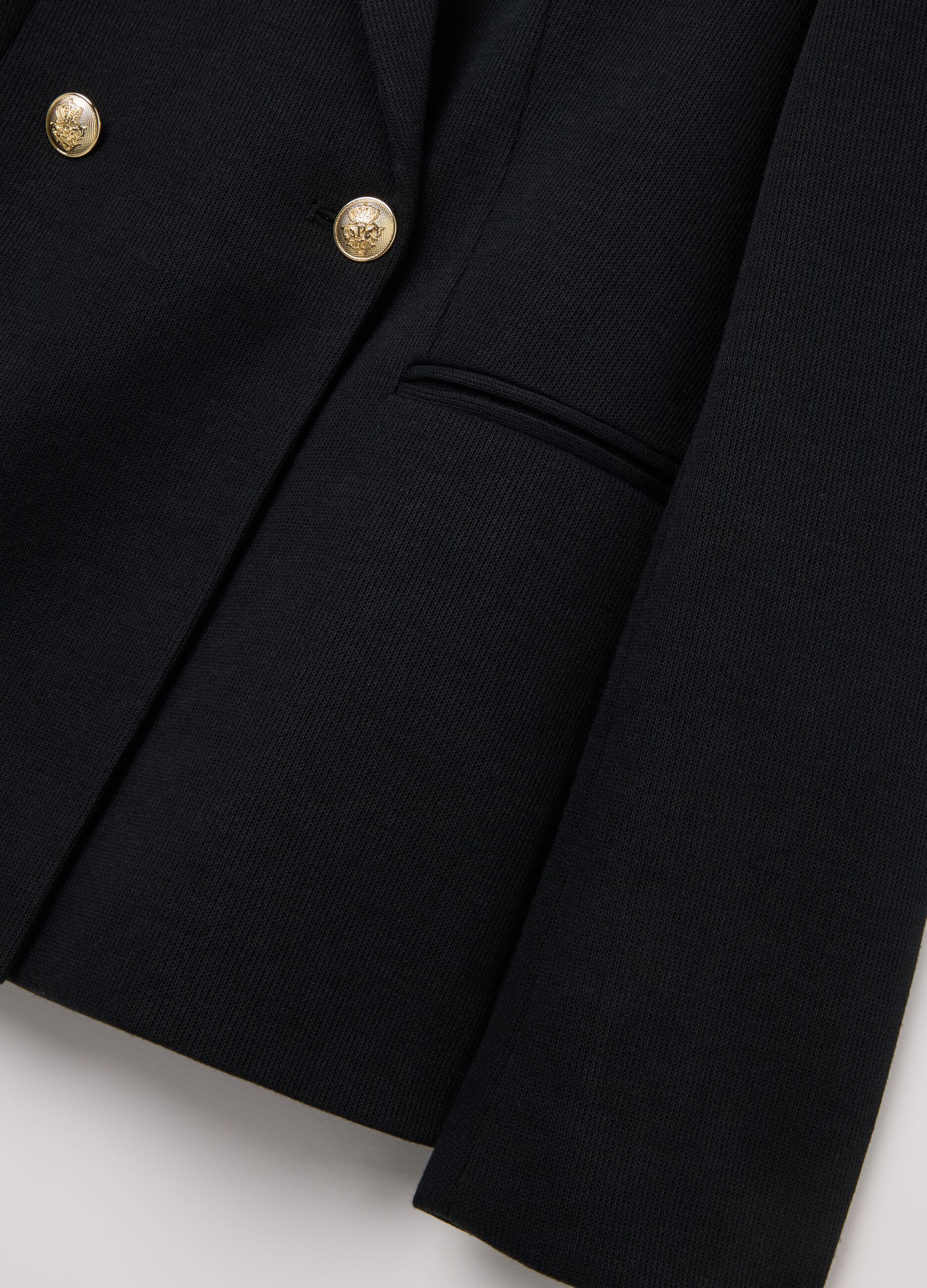 Blazer cruzado de punto con botones dorados