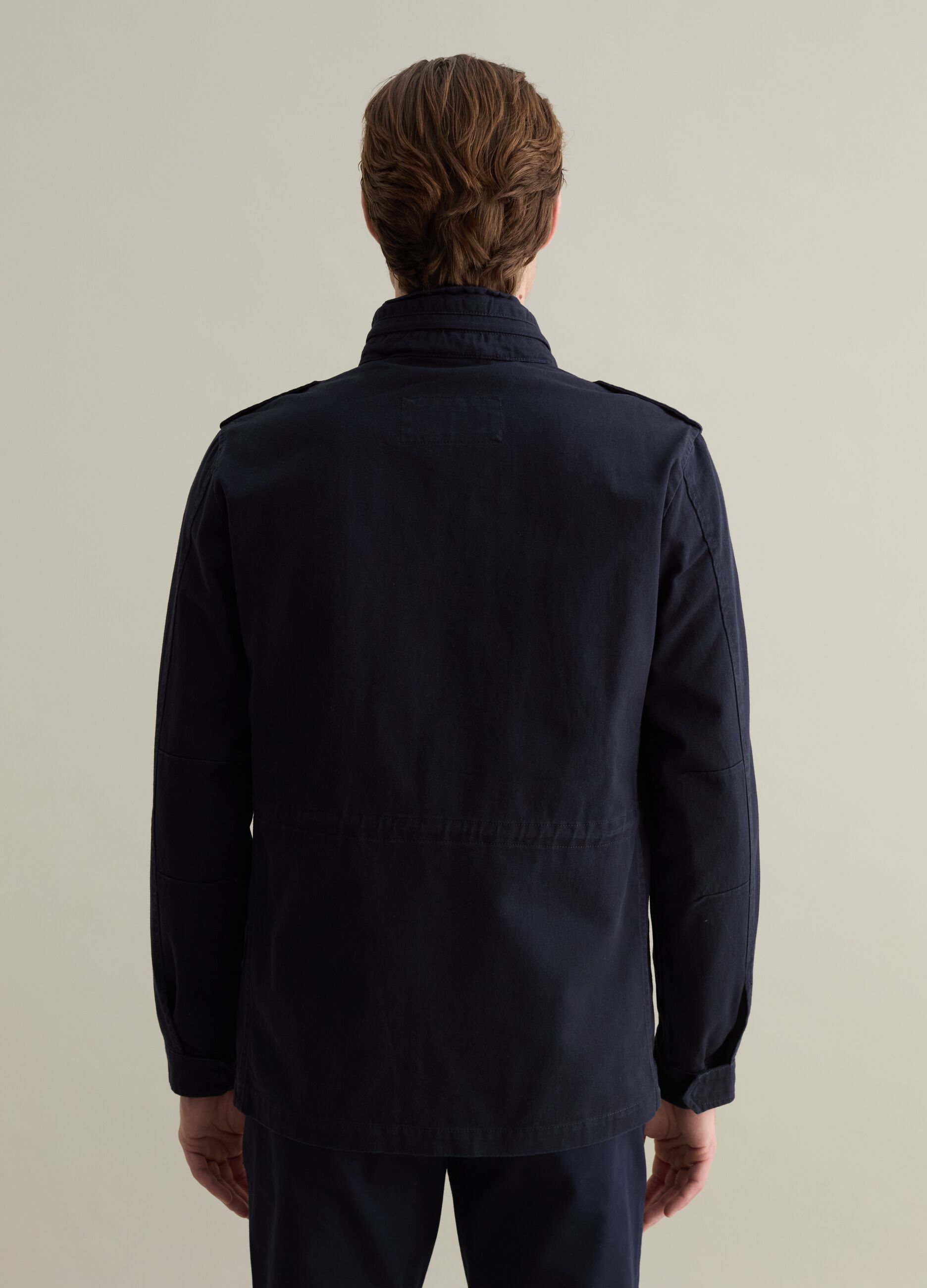 Short safari jacket with internal hood