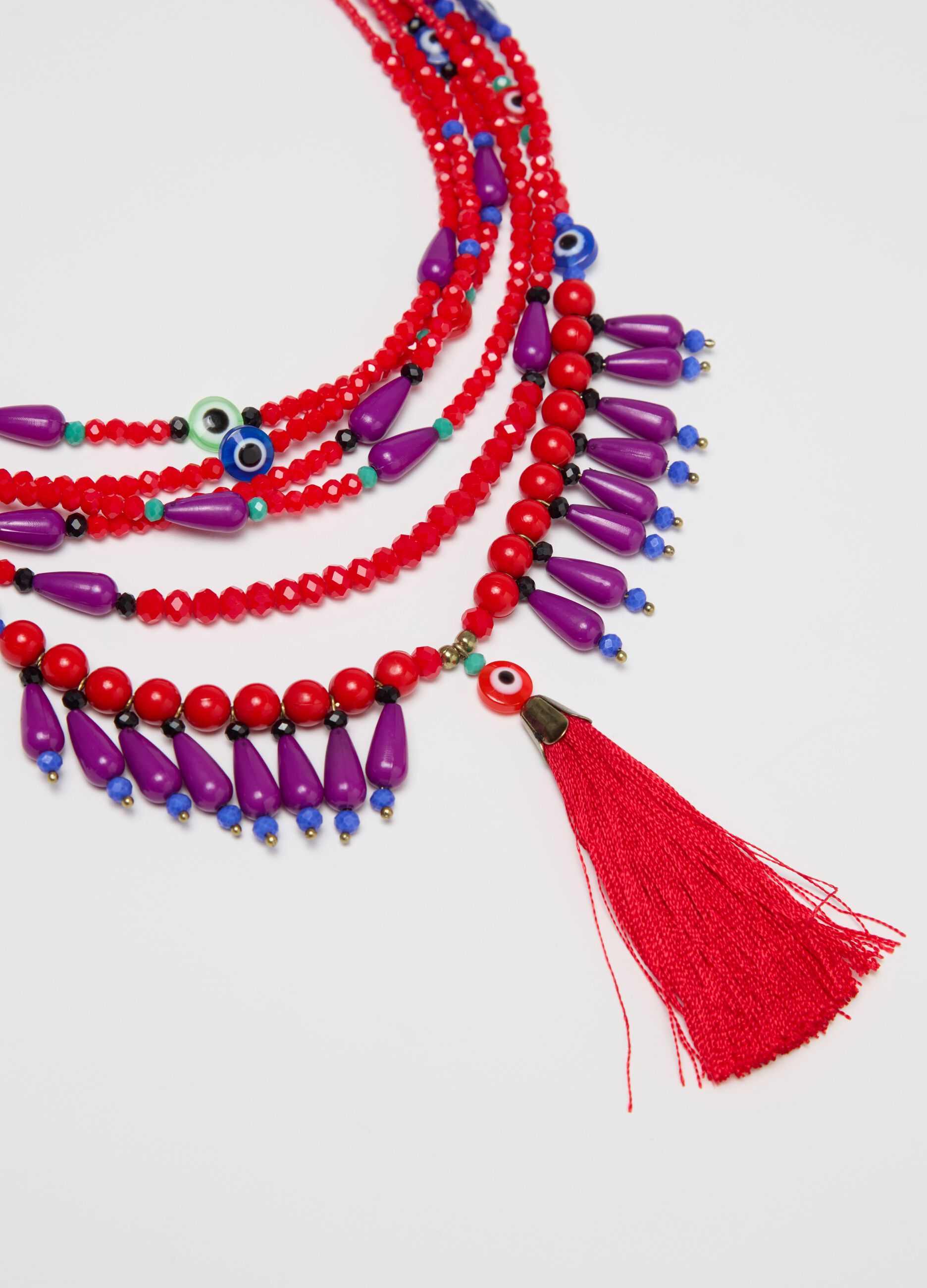 Collar multicadenas con cuentas y borla