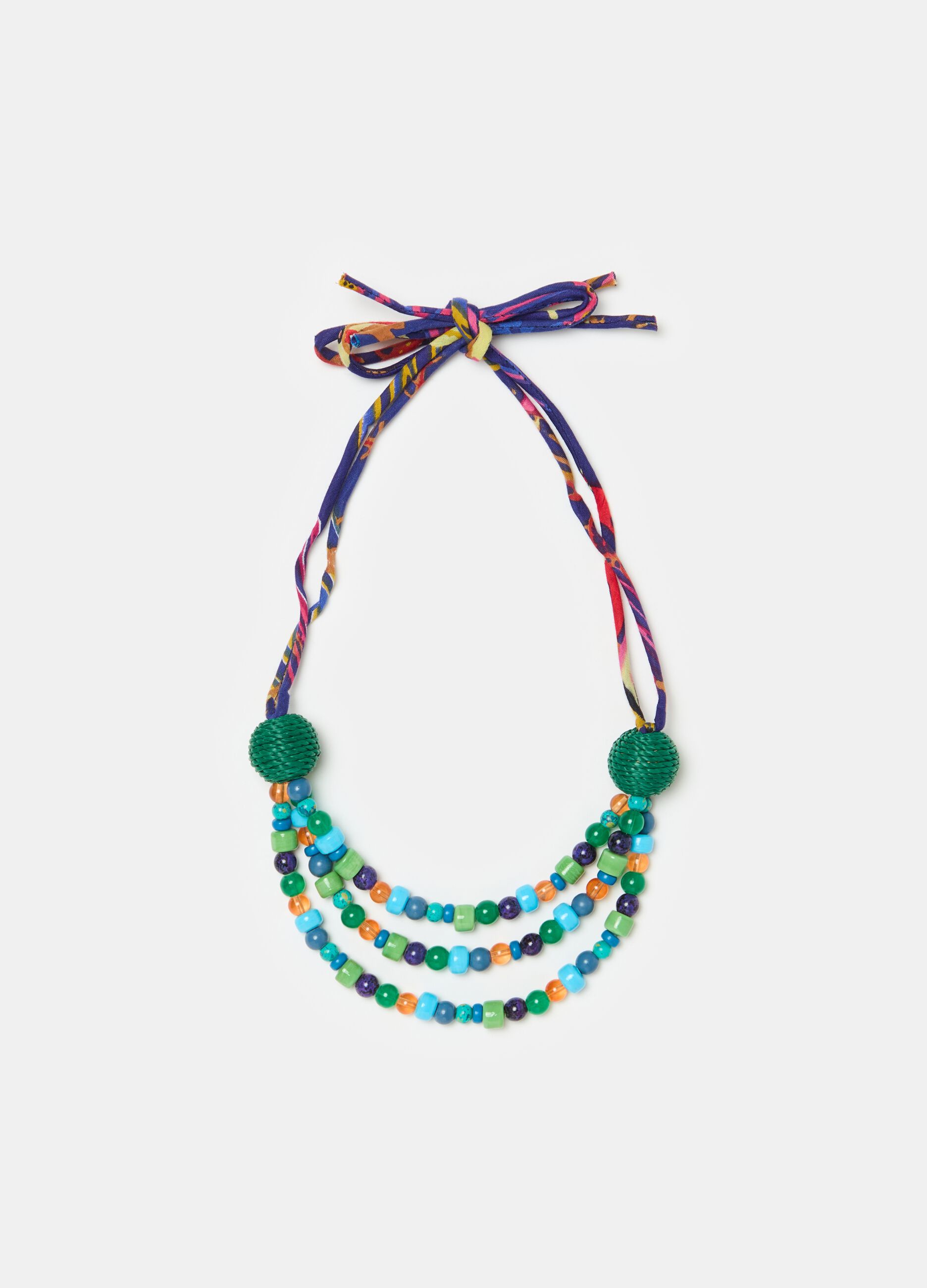Necklace with coloured gems and laces_0