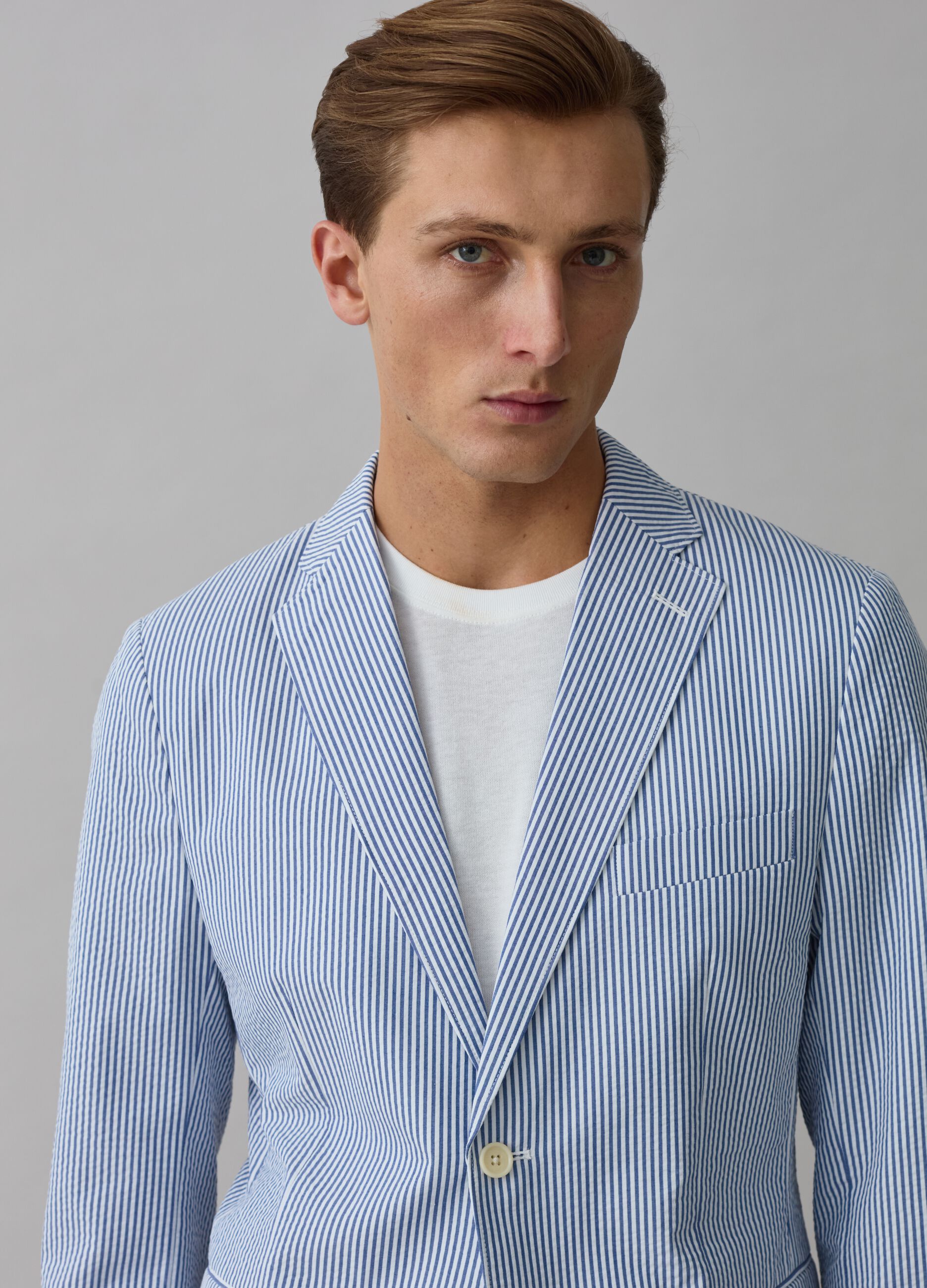 Contemporary single-breasted blazer with thin stripes