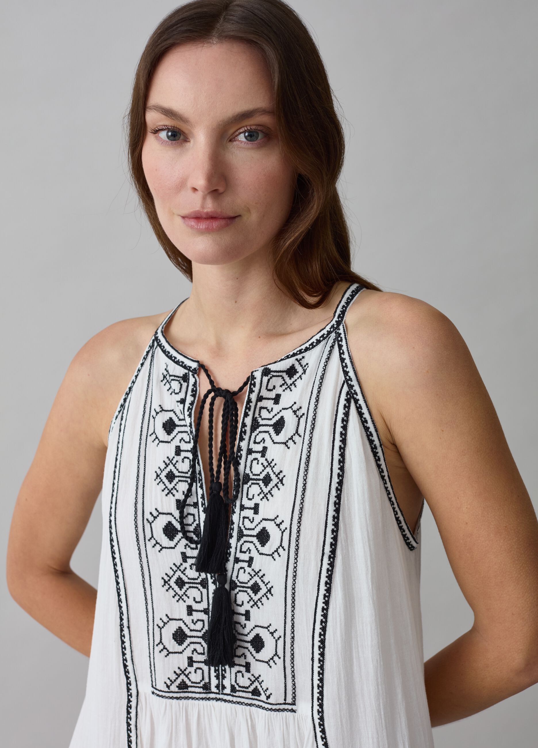 Dress with ethnic embroidery and tassels