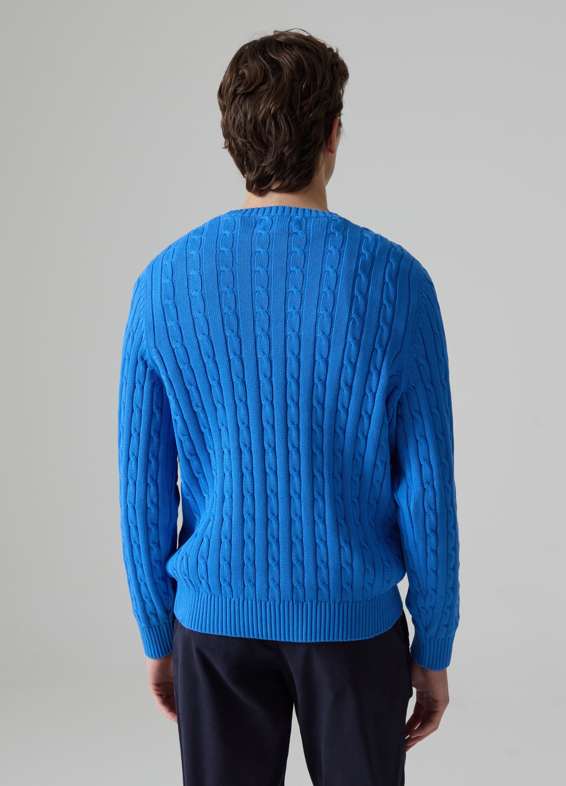 Ribbed pullover with cable-knit motif