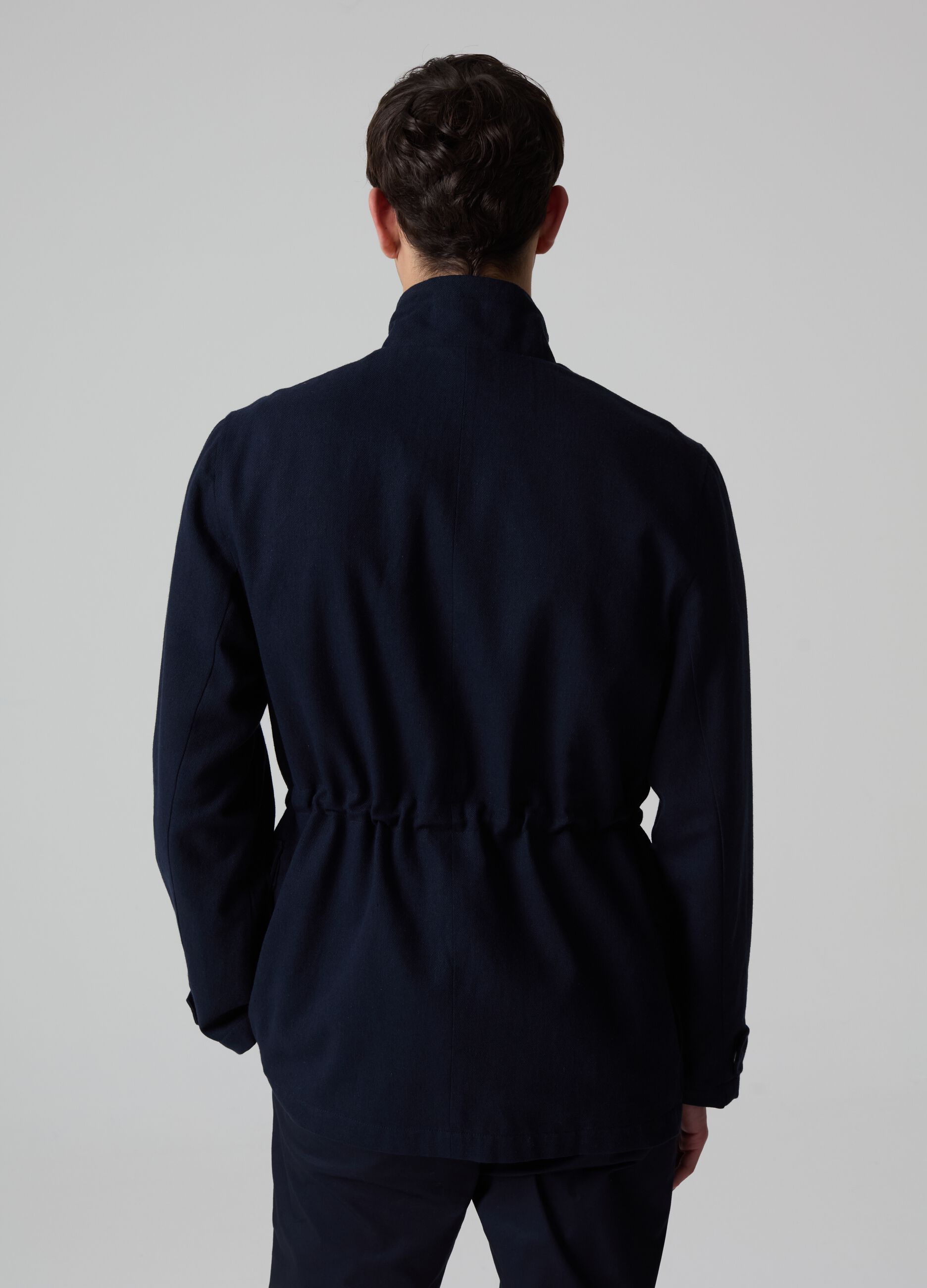 Contemporary short jacket with high neck