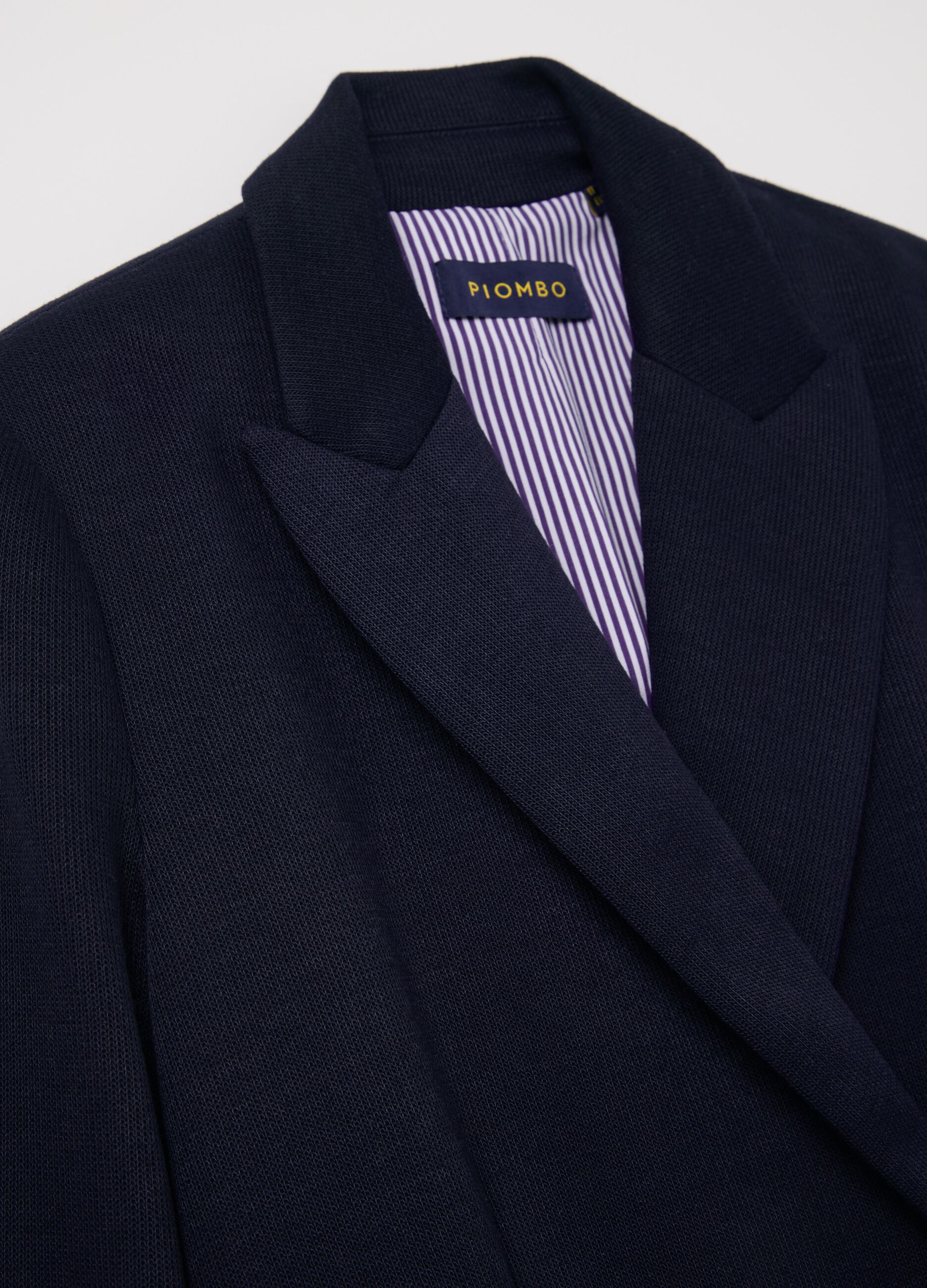 Blazer cruzado de punto con botones dorados