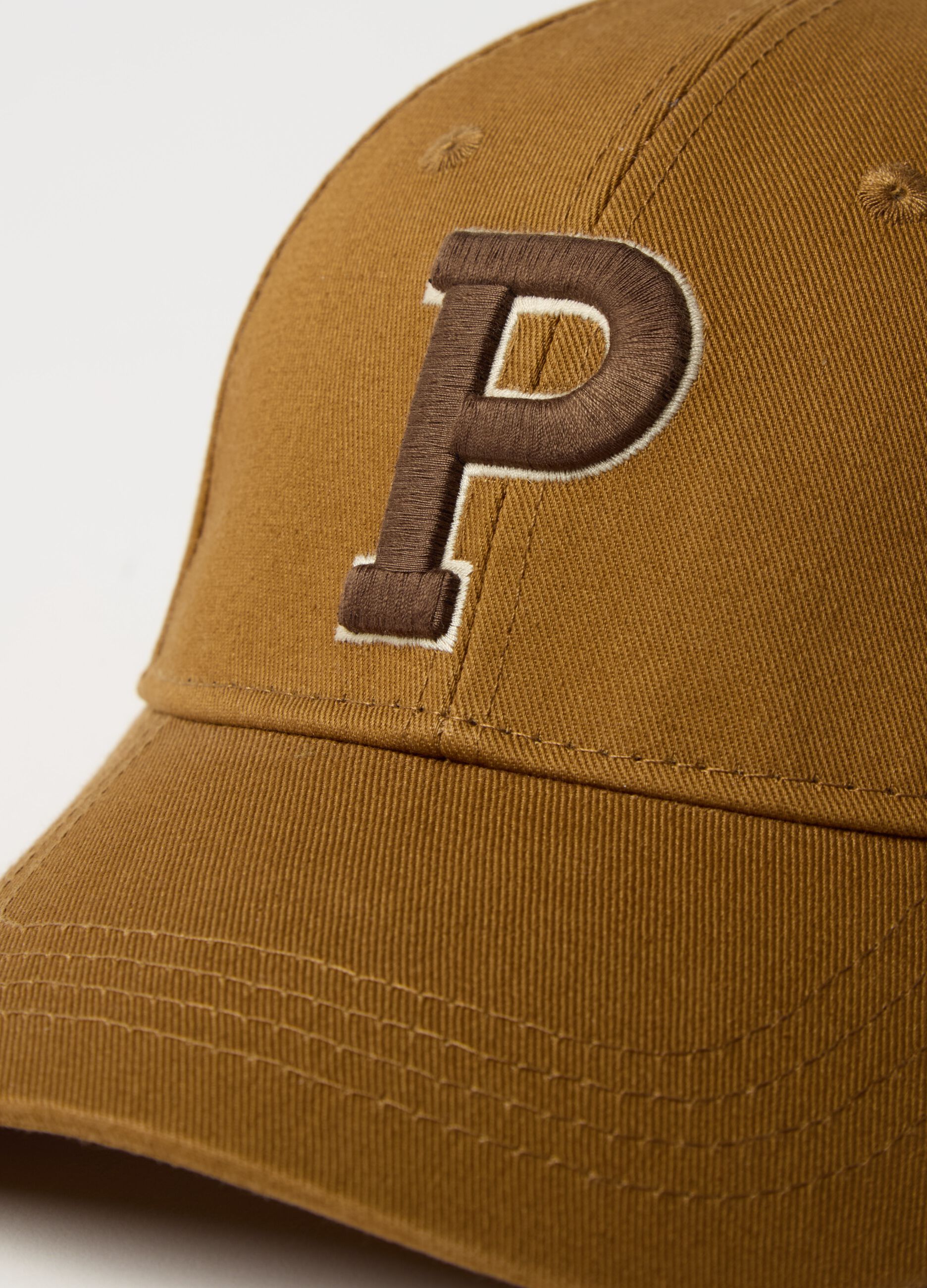 Baseball cap with embroidered logo