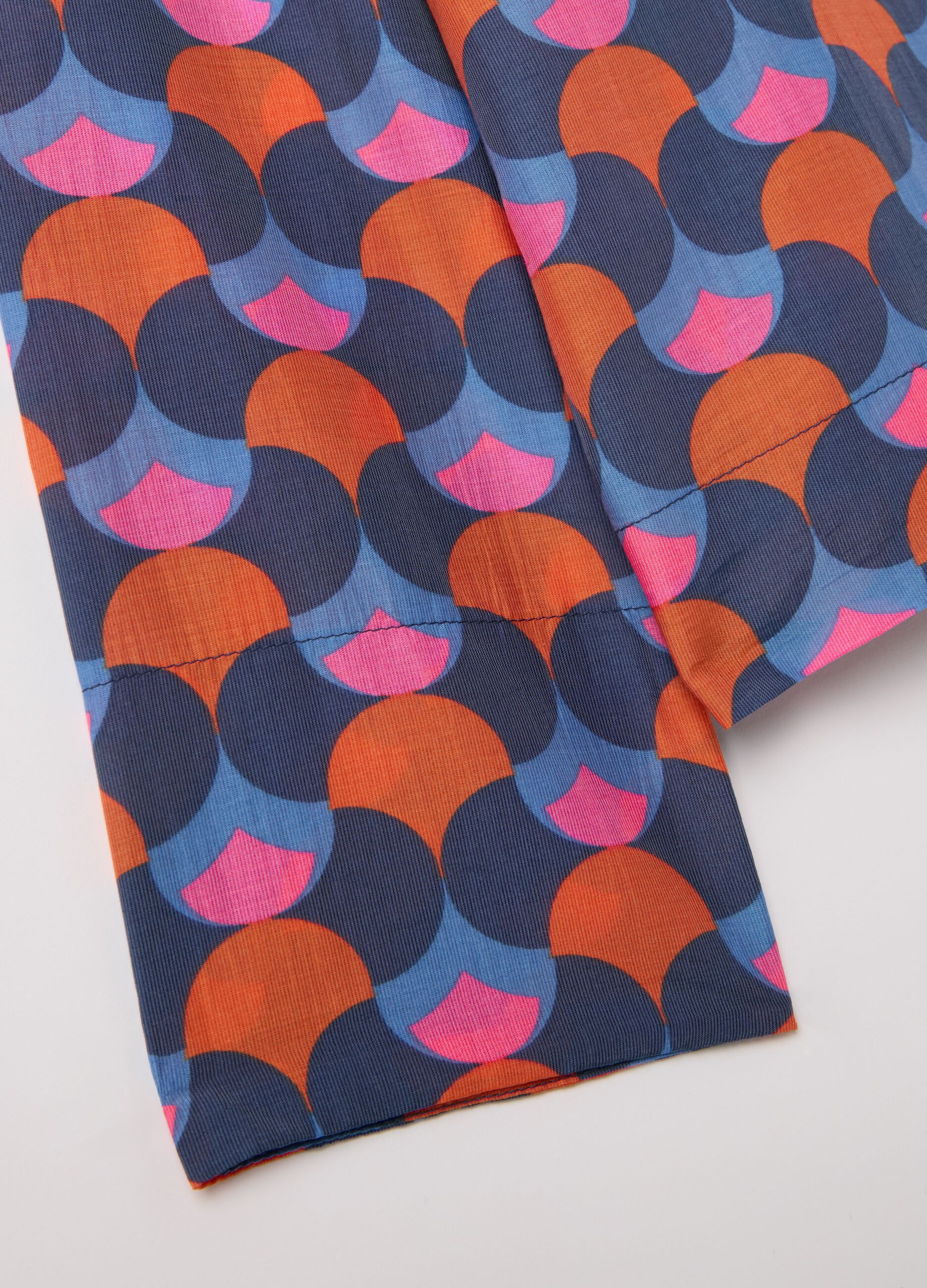 Blouse with optical pattern and V neck