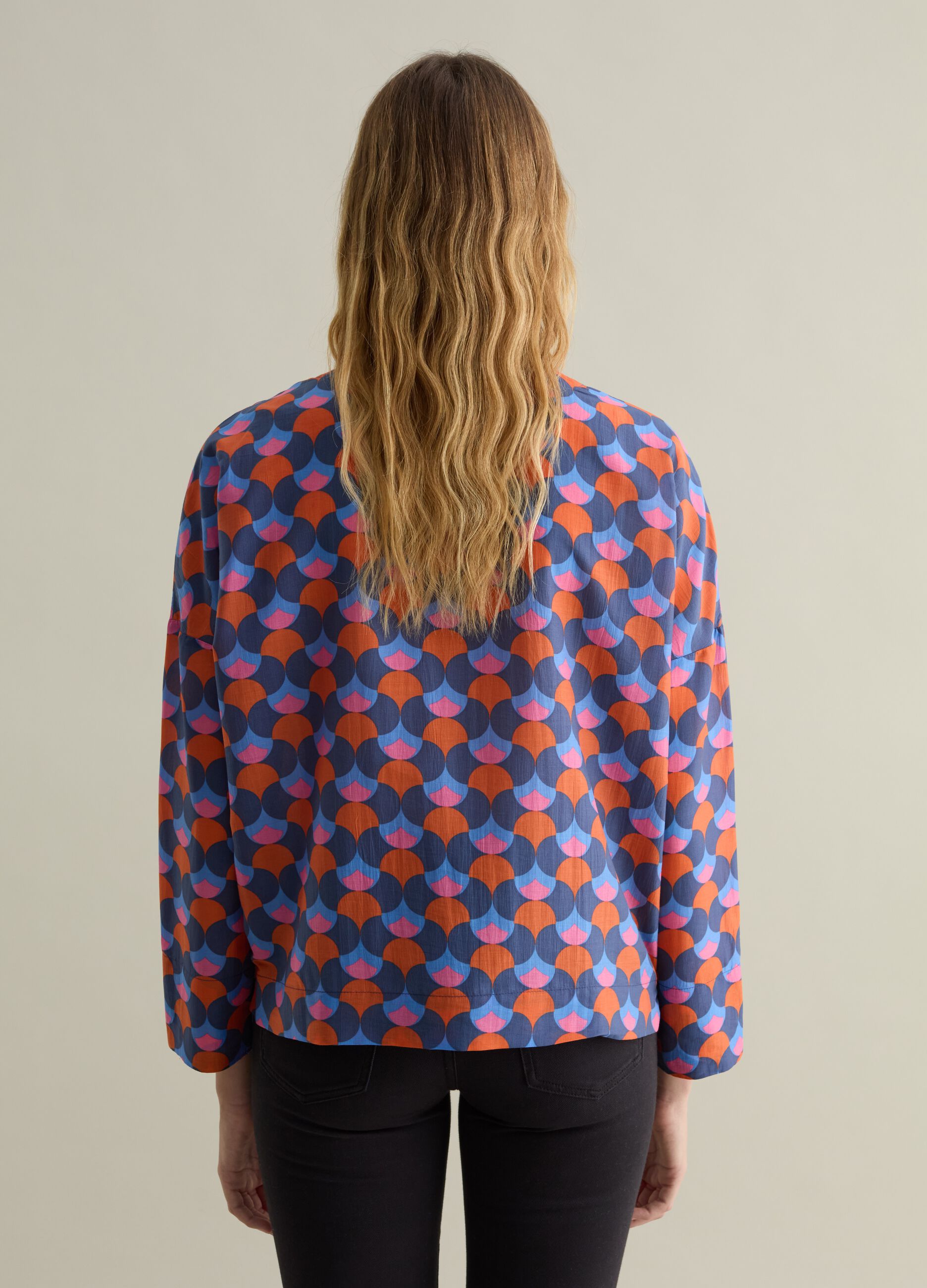 Blouse with optical pattern and V neck